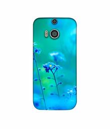 Amazon Brand - Solimo Designer Blue Flower 3D Printed Hard Back Case Mobile Cover for HTC One M8