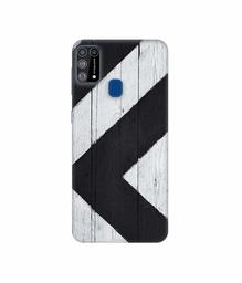 Amazon Brand - Solimo Designer Black Paint Texture on Wood 3D Printed Hard Back Case Mobile Cover for Samsung Galaxy M31