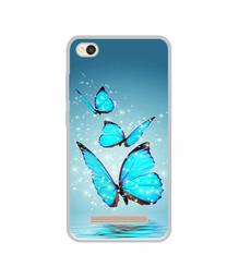 Amazon Brand - Solimo Designer Flying Butterflies UV Printed Soft Back Case Mobile Cover for Mi Redmi 4A