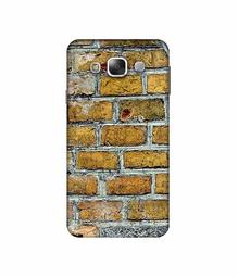 Amazon Brand - Solimo Designer Yellowesh Brick Texture 3D Printed Hard Back Case Mobile Cover for Samsung Galaxy E5