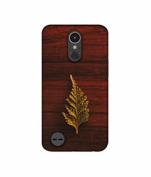 Amazon Brand - Solimo Designer Leaf on Wood UV Printed Soft Back Case Mobile Cover for LG K10 (2017)