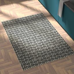 Amazon Brand – Rivet Contemporary Handtufted Cotton-and-Wool Area Rug with Geometric Feathered Pattern, 4' x 6', Black and Cream