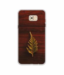 Amazon Brand - Solimo Designer Leaf on Wood UV Printed Soft Back Case Mobile Cover for Samsung Galaxy C7 Pro