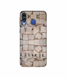 Amazon Brand - Solimo Designer Like On Wooden Block 3D Printed Hard Back Case Mobile Cover for Samsung Galaxy M21