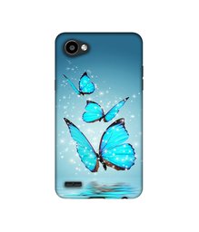 Amazon Brand - Solimo Designer Flying Butterflies UV Printed Soft Back Case Mobile Cover for LG Q6