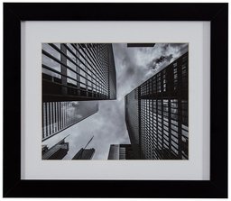 Amazon Brand – Rivet Ground View Black and White Photography Matted Skyscrapers Wall Art, Black Frame, 22