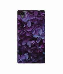 Amazon Brand - Solimo Designer Purple Flowers 3D Printed Hard Back Case Mobile Cover for Sony Xperia L1