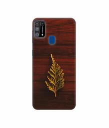 Amazon Brand - Solimo Designer Leaf on Wood 3D Printed Hard Back Case Mobile Cover for Samsung Galaxy M31