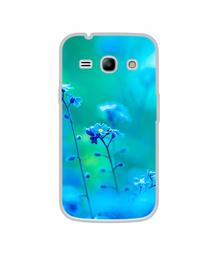 Amazon Brand - Solimo Designer Blue Flower UV Printed Soft Back Case Mobile Cover for Samsung Galaxy J1