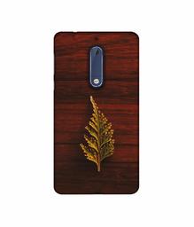 Amazon Brand - Solimo Designer Leaf on Wood 3D Printed Hard Back Case Mobile Cover for Nokia 5